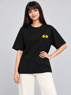 Black Flower Bicycle Mini Print Oversized T-Shirt — relaxed model pose