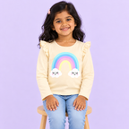 Girls' Cream Rainbow Clouds Printed Ruffle Shoulder Full Sleeve Top - seated model view