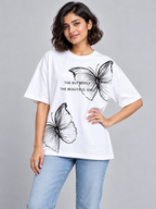 White Butterfly Graphic Oversized T-Shirt — relaxed model pose