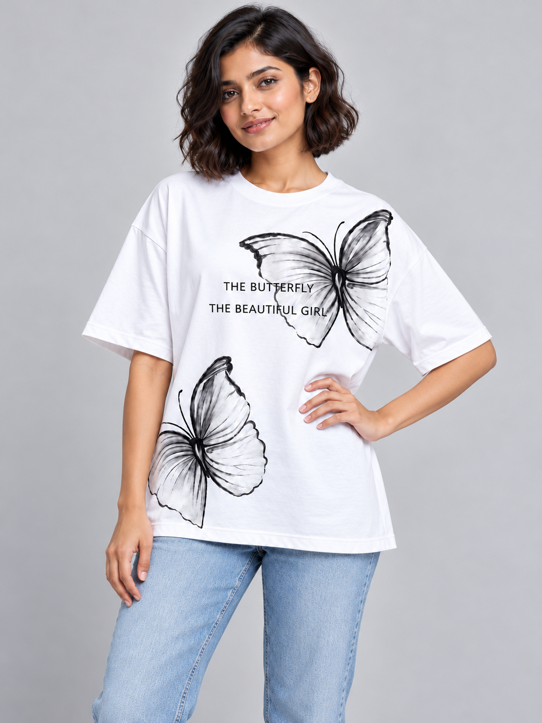 White Butterfly Graphic Oversized T-Shirt — relaxed model pose