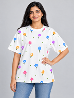 White Multicolour Daisy Printed Oversized T-Shirt — three-quarter pose