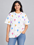 White Multicolour Daisy Printed Oversized T-Shirt — relaxed pose
