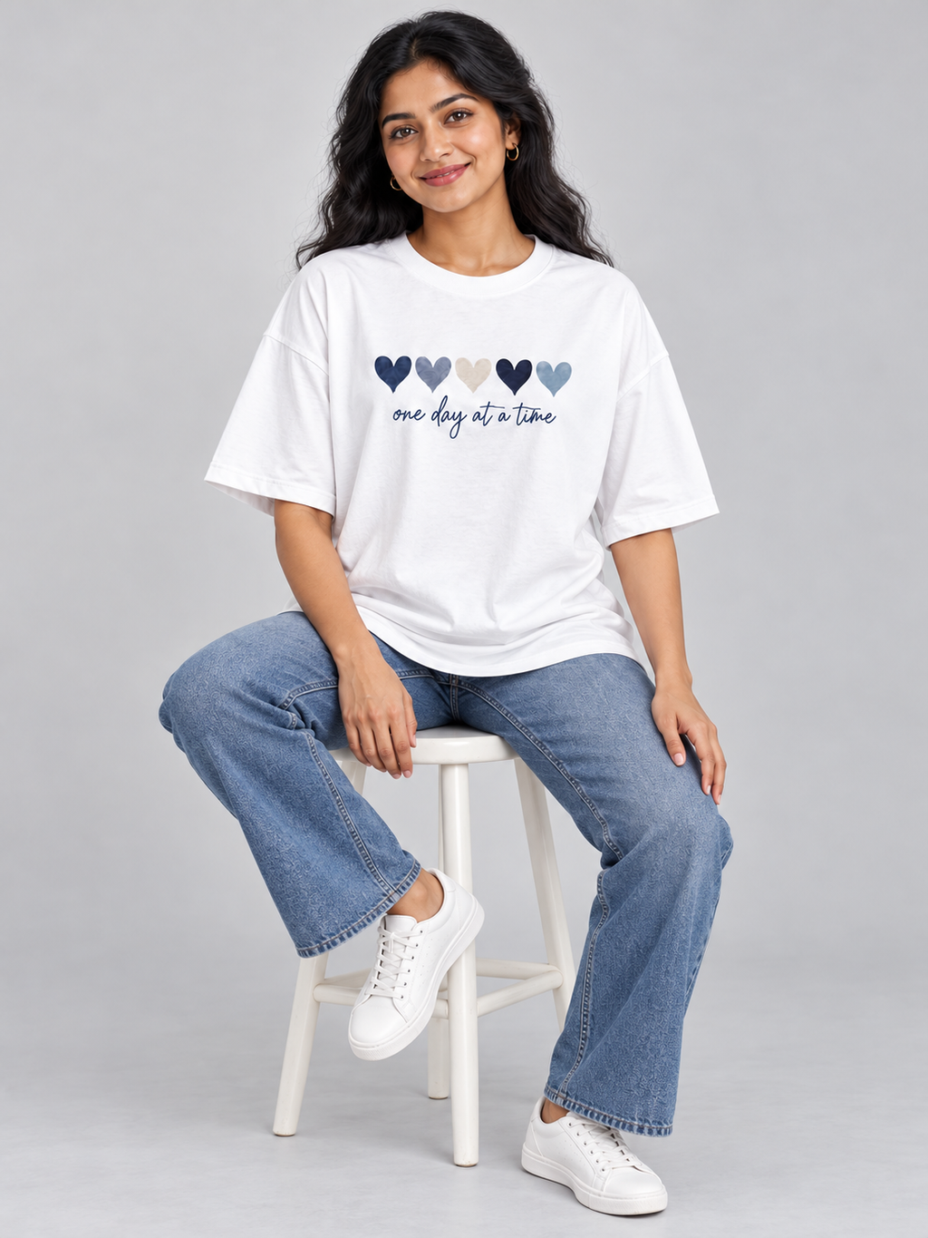 white one day hearts oversized T-shirt — seated model view